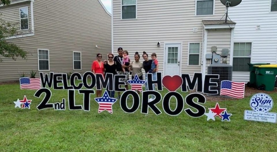 military coming home signs